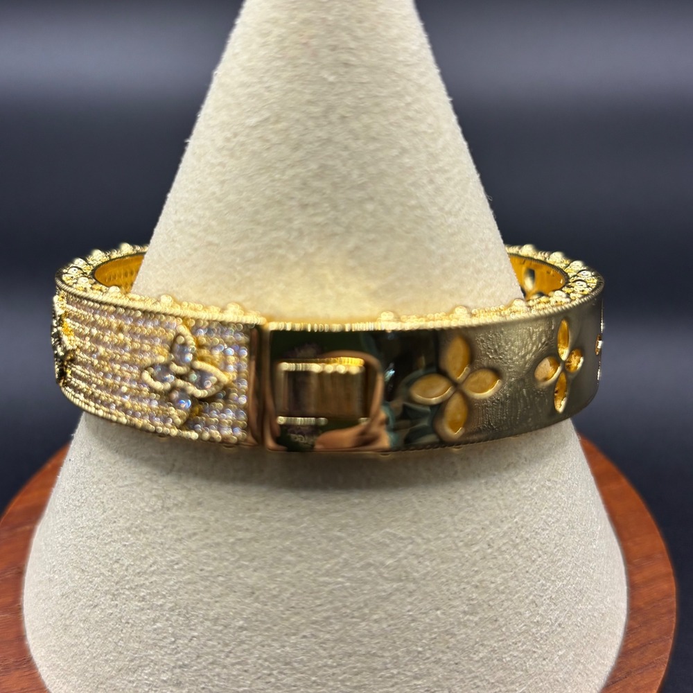 Gold Tone Crystal Pave Floral Quatrefoil Hinged Bangle Bracelet 6.75 Inch